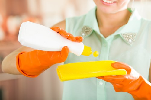 Cricklewood carpet cleaning staff member wearing PPE during a service visit
